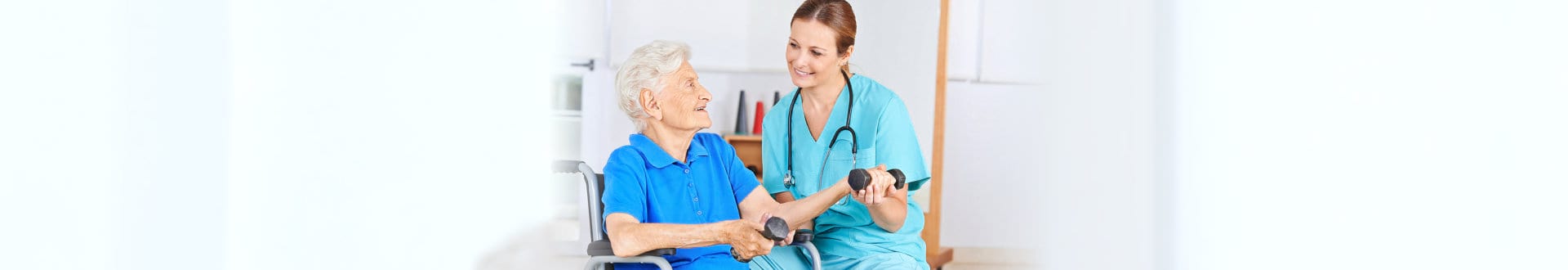 female medical staff assisting senior woman